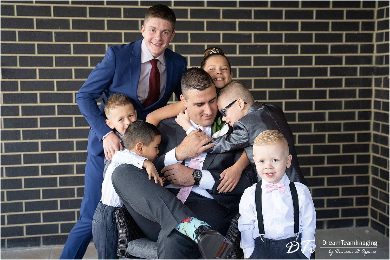 Groom with his nephews and nieces during groom prep