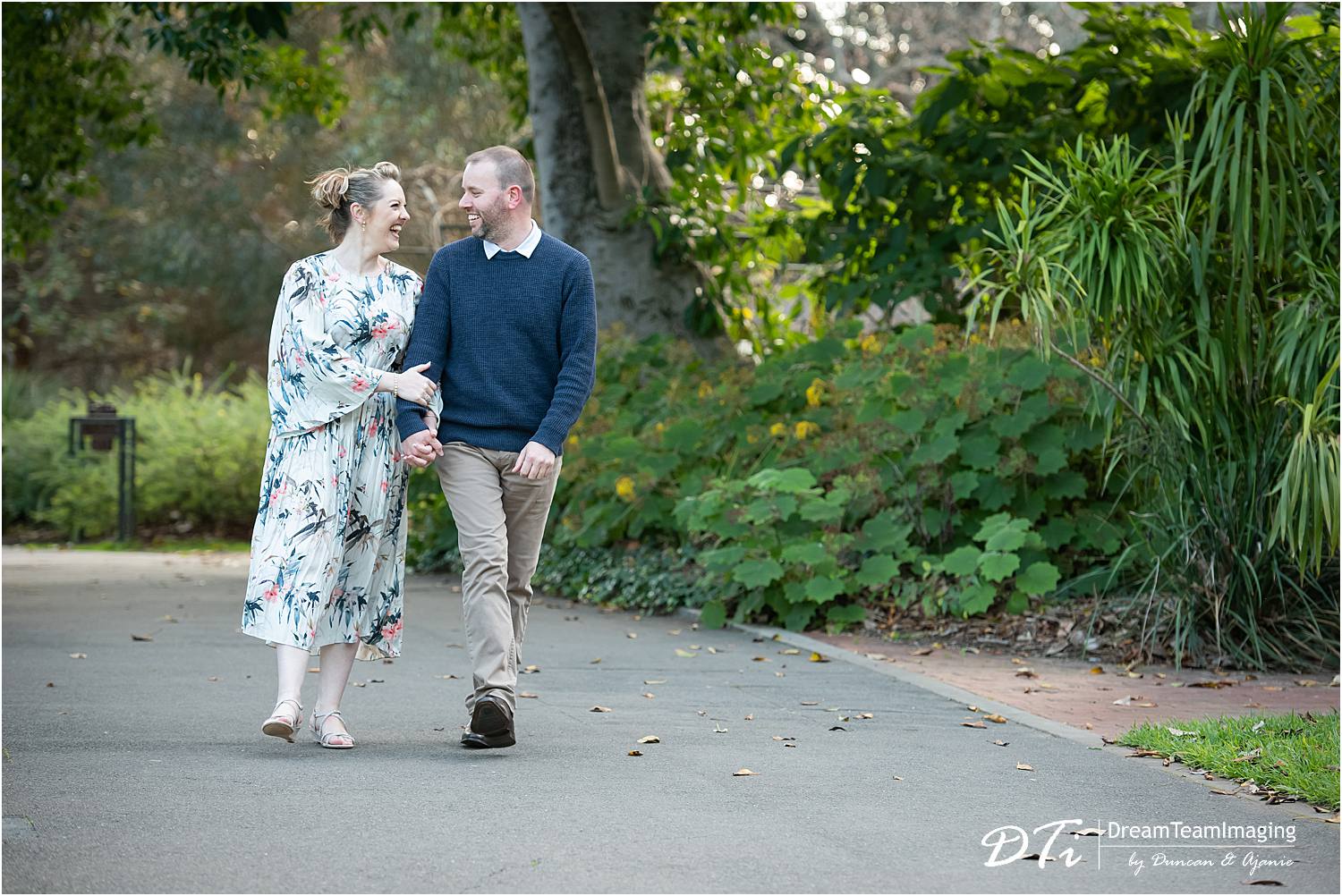 Couple engagement session at Botanic Gardens Adelaide, couple hugging and walking