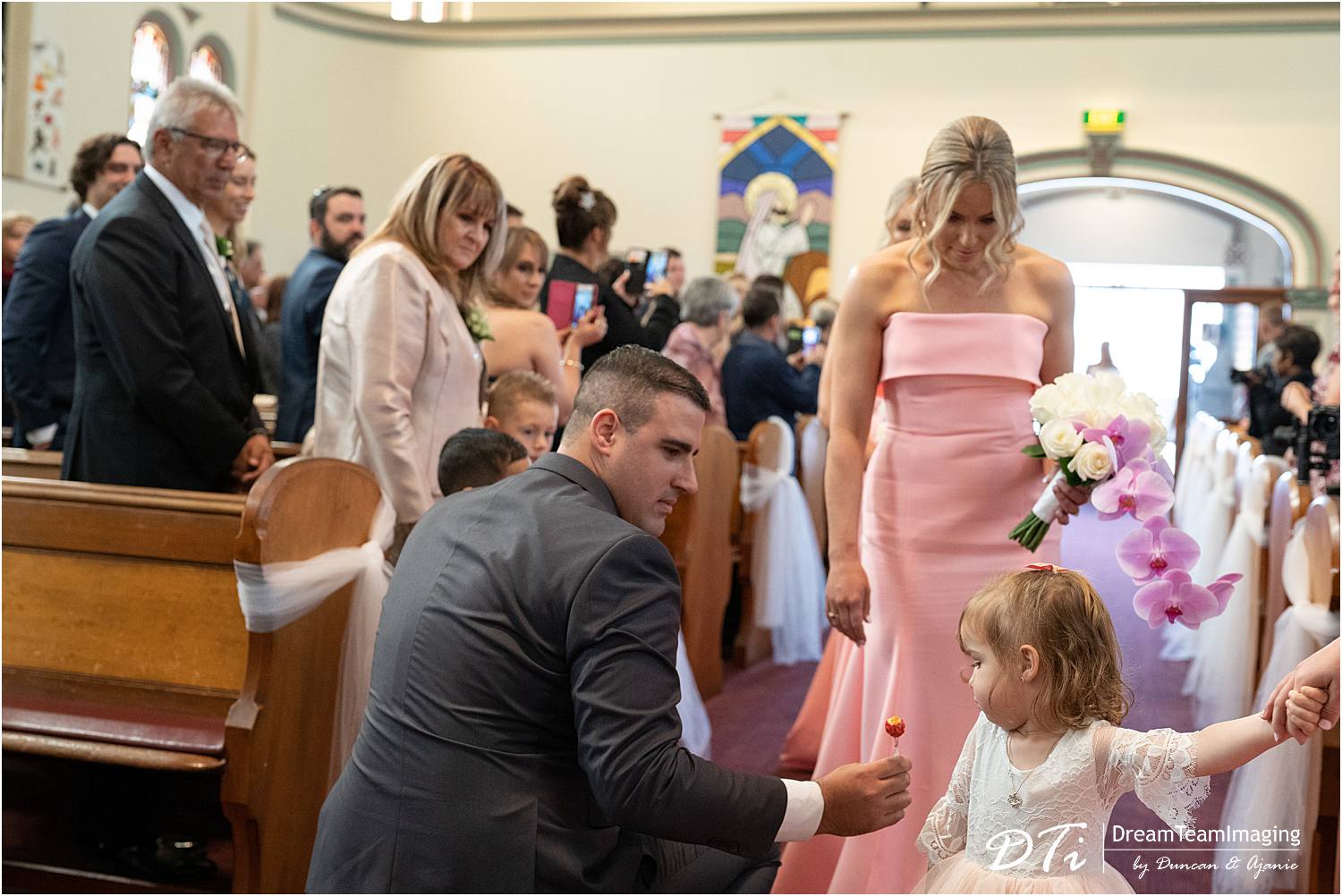 Groom with the flower girl St Andrews by the Sea Uniting Church Glenelg