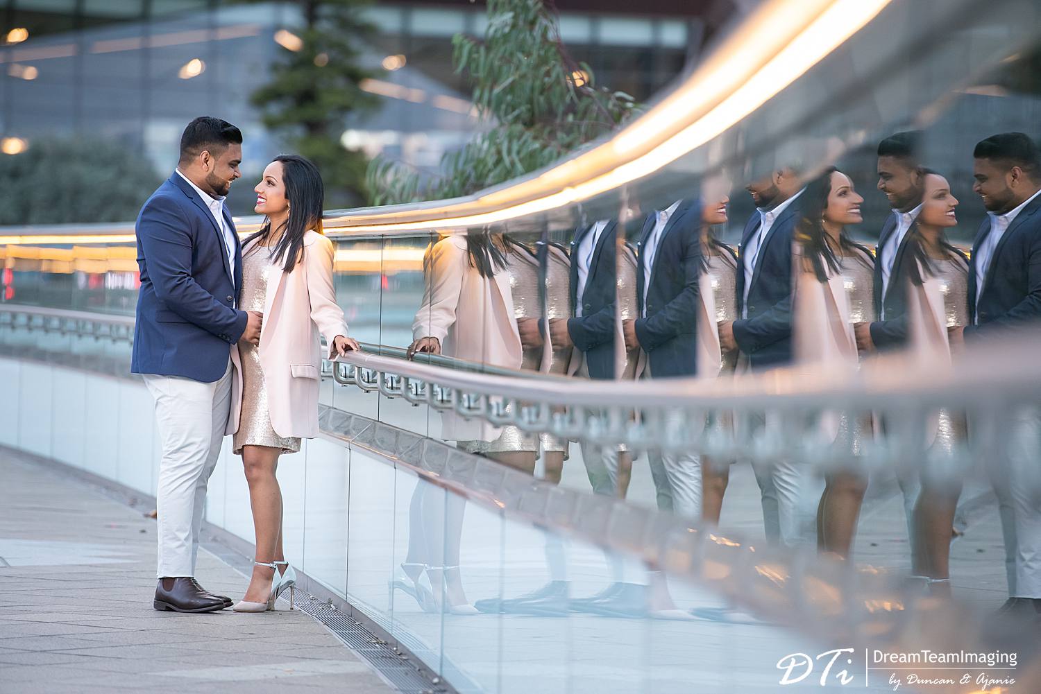 Engagement photography session, Couple having fun on the footbridge in near cbd, relaxed and natural photography session, Sri Lankan couple engagement photos